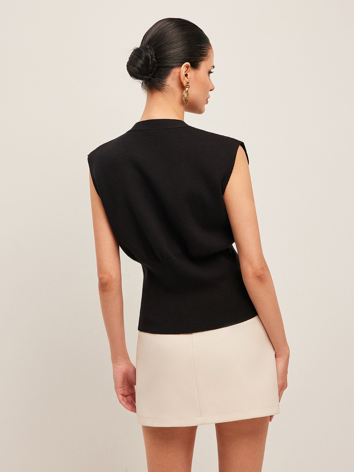Orée I Gilet tricoté à détails élégants